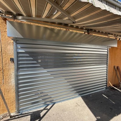 Dernière réalisation METAL 2000 Lyon - Villeurbanne - Vénissieux - Installation, dépannage rideaux métalliques et réparation porte garage (69)