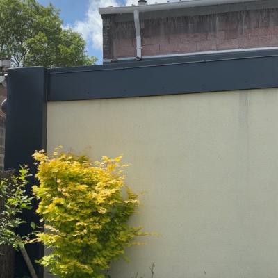 Réalisation d'un habillage en acier de couleur Anthracite pour cacher tout les défauts du mur 3